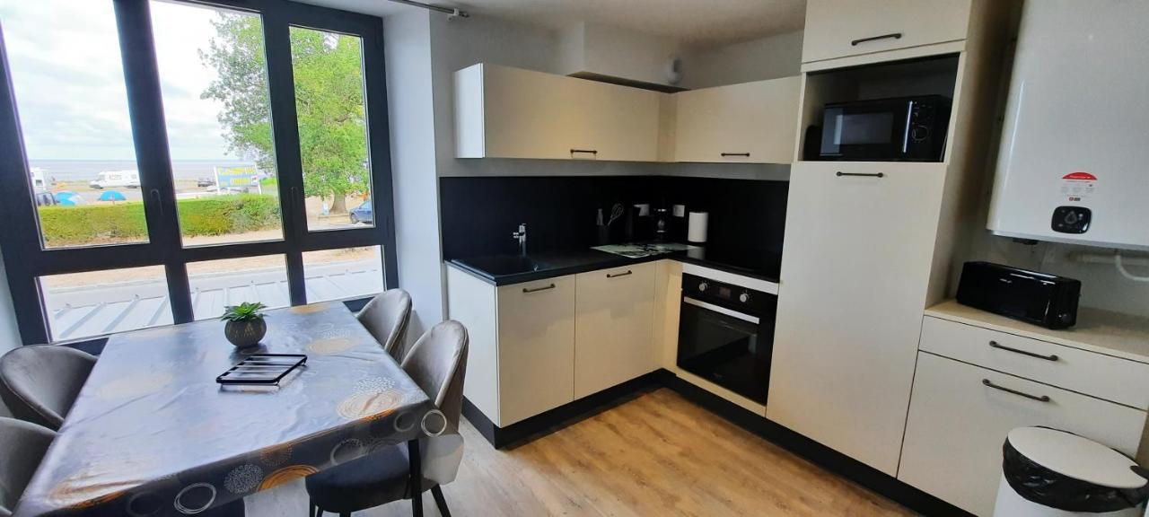 Les Appartements De La B Saint-Benoît-des-Ondes Exterior photo