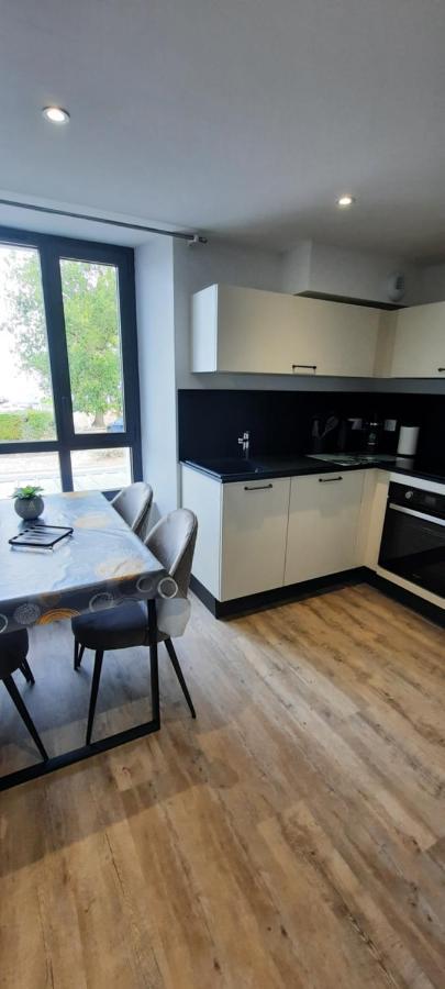 Les Appartements De La B Saint-Benoît-des-Ondes Exterior photo