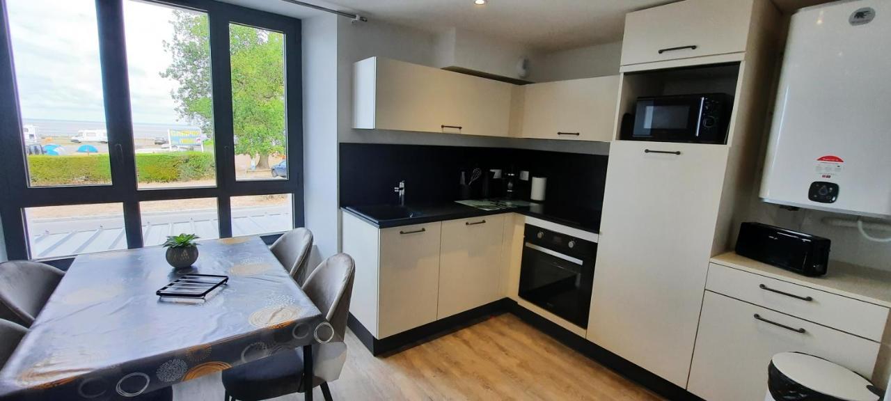 Les Appartements De La B Saint-Benoît-des-Ondes Exterior photo
